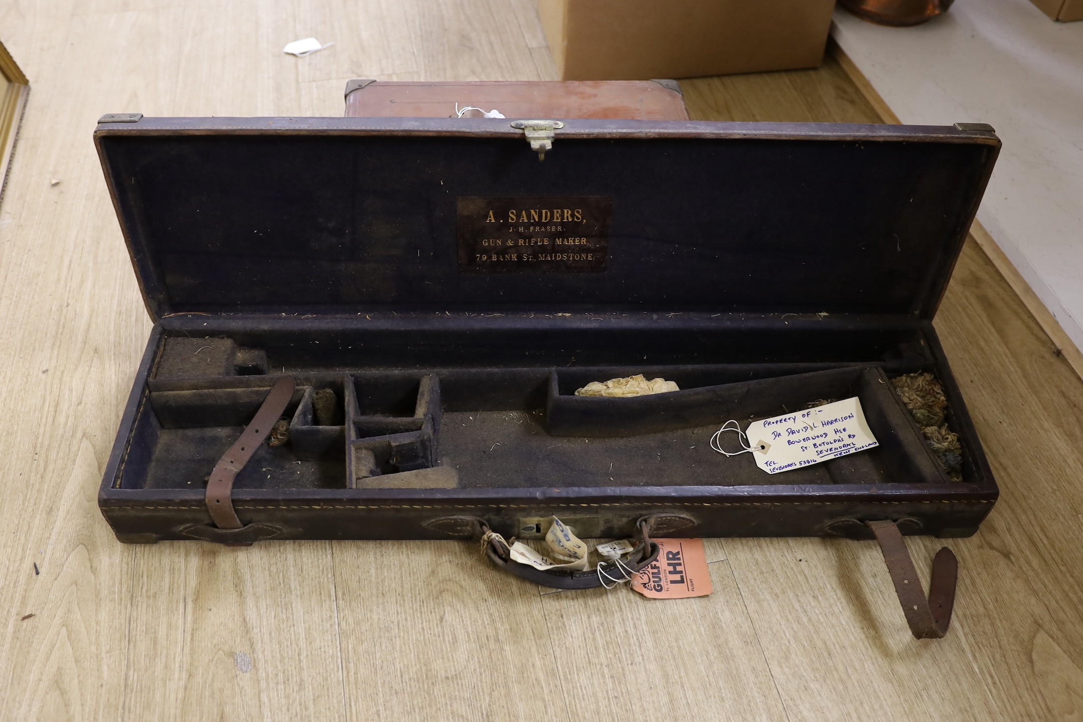 A 19th century leather cartridge magazine and a similar gun case (2)